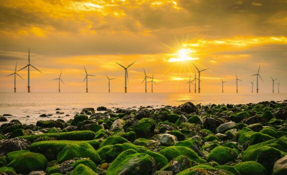 Offshore wind turbines during sunset